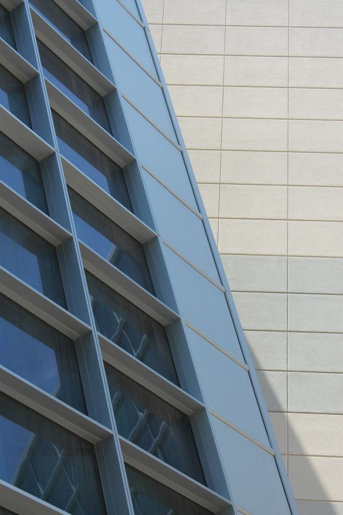 urban photo of a blue and white building